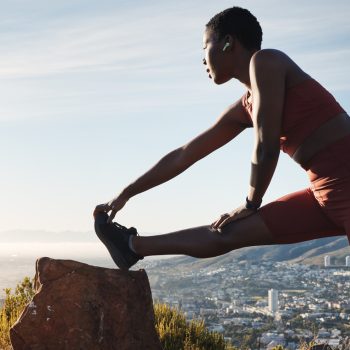 Black woman, stretching and outdoor exercise, workout and training for wellness, health and fitness.